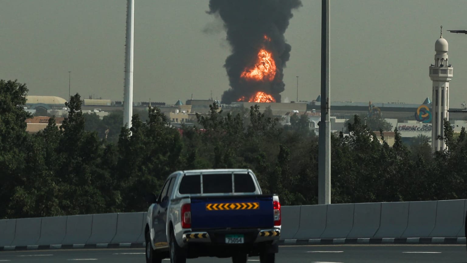 Smoke rising near Dubai International Airport following a drone strike linked to the Iran conflict, March 2026