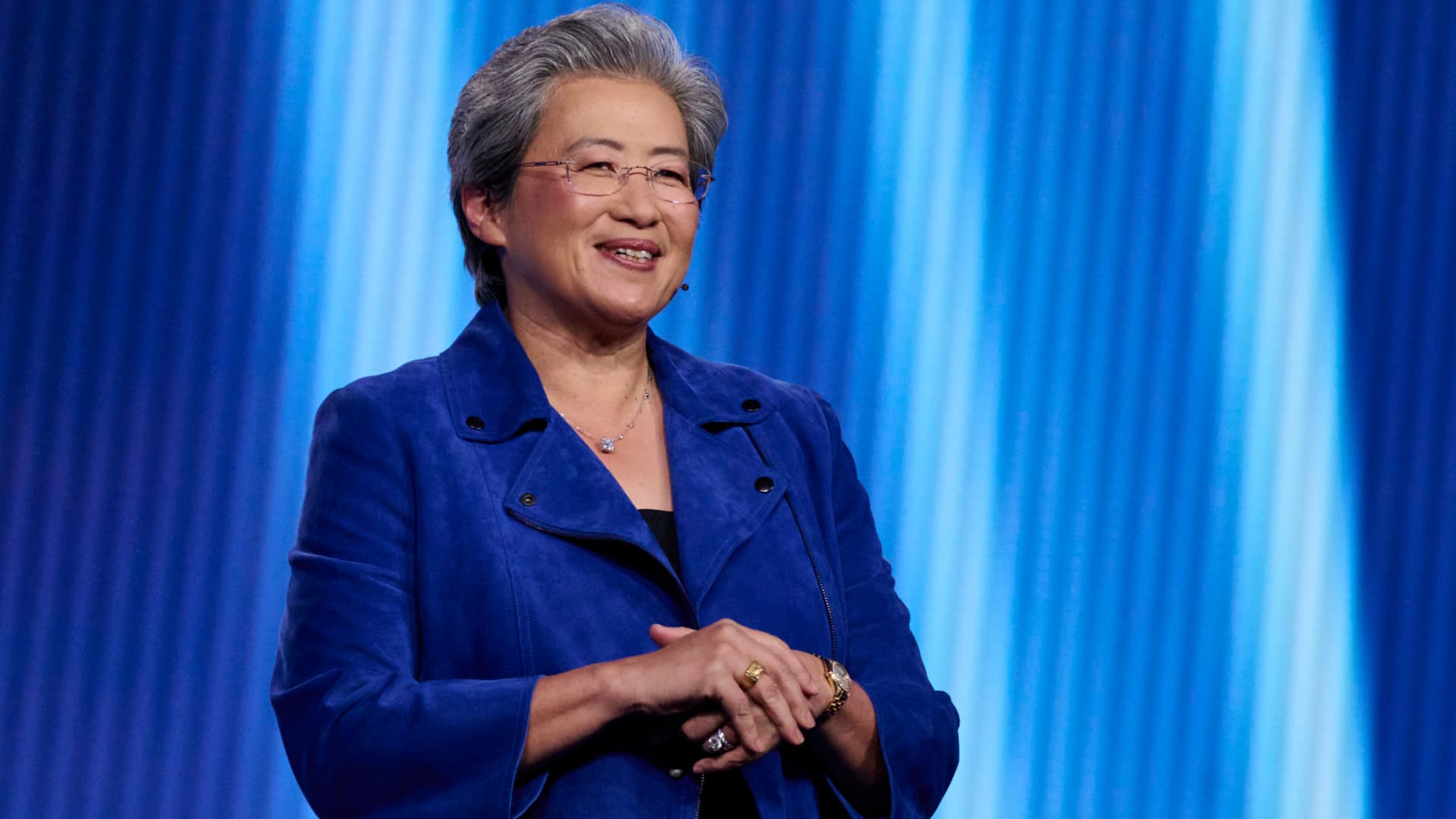 AMD CEO Lisa Su presenting Instinct AI accelerator chips at CES 2026 representing the data-center AI bid that drove Q1 revenue to $10.3 billion and $11.2B Q2 guide, ThriveInMarkets daily morning analysis May 6 2026