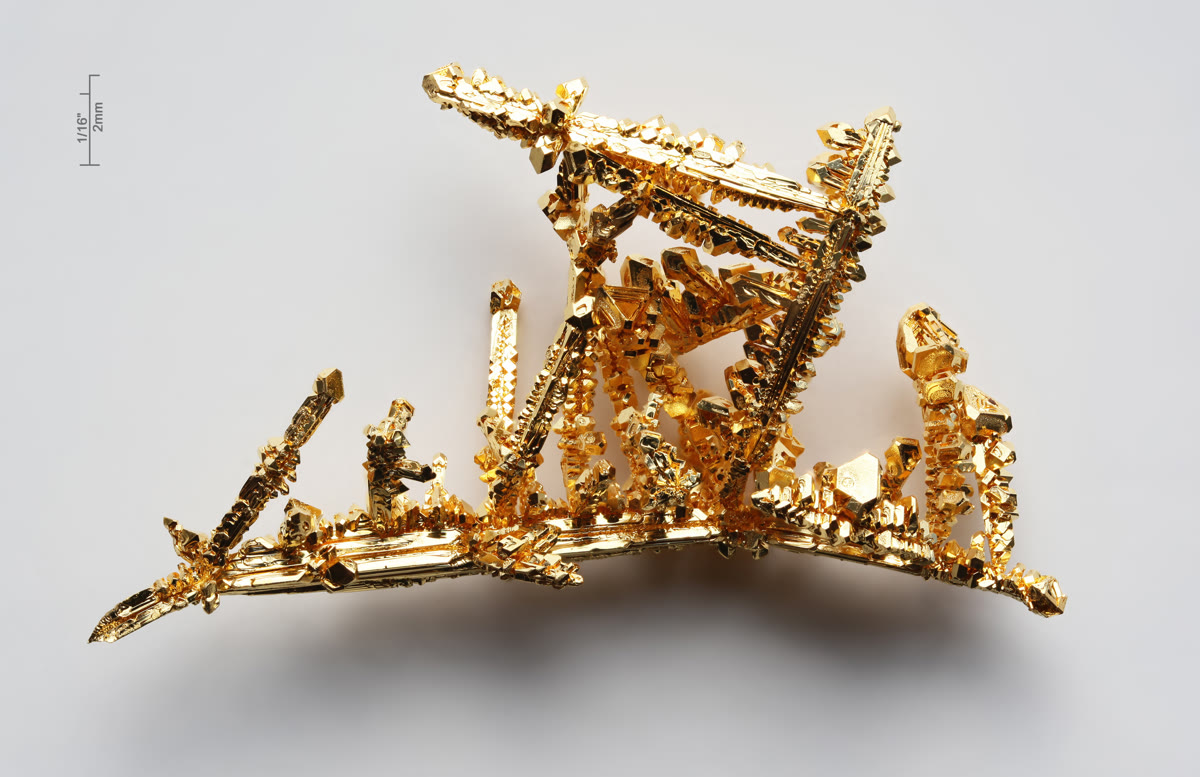 Gold crystals and bullion representing the gold price rally to $4,820 on April 8 2026