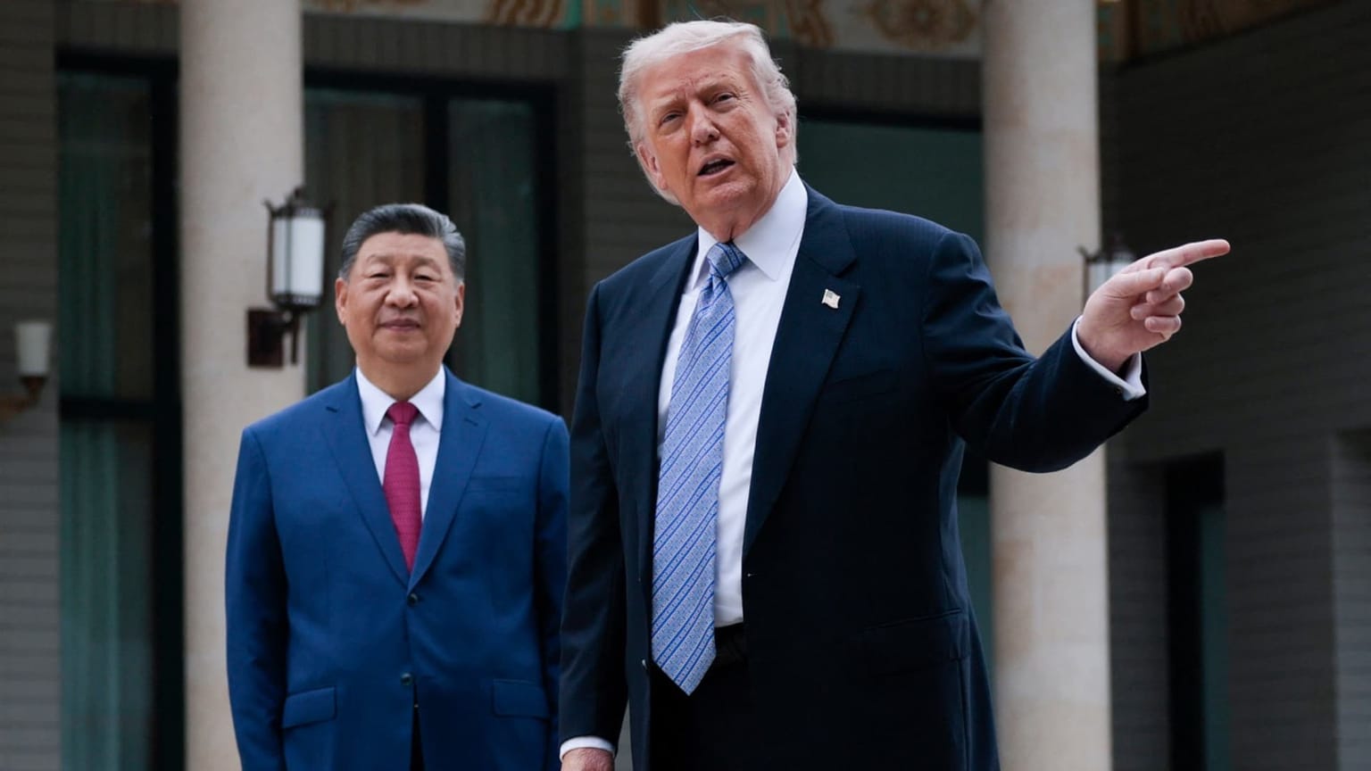 US President Donald Trump points while walking with Chinese President Xi Jinping in front of a colonnaded building during their September 2026 state visit, used as the ThriveInMarkets weekend recap hero for September 21 to 27 2026, when the two leaders extended the Busan trade truce to January 10, the S&P 500 closed Friday at 7,743.41 up 1.2 percent on the week, West Texas Intermediate settled 92.41 dollars, and Bitcoin last printed about 84,835 dollars live on Sunday
